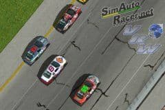 Cars racing three wide